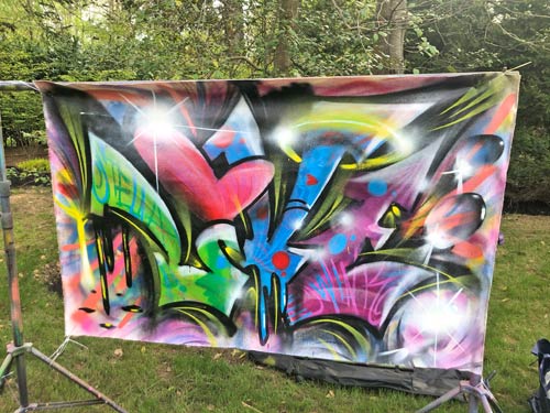 colorful canvas with graffiti on it
