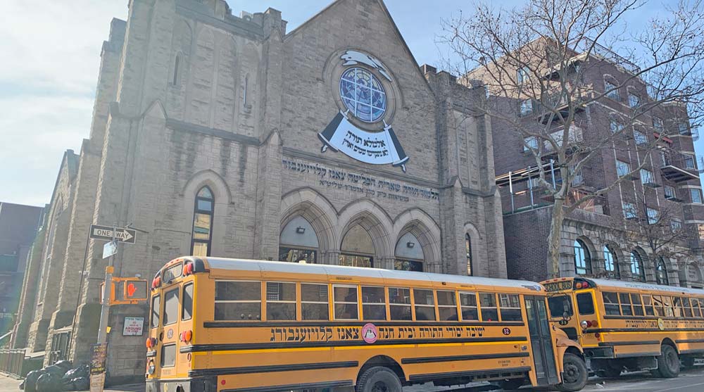 Jewish school bus parked in front of synagogue
