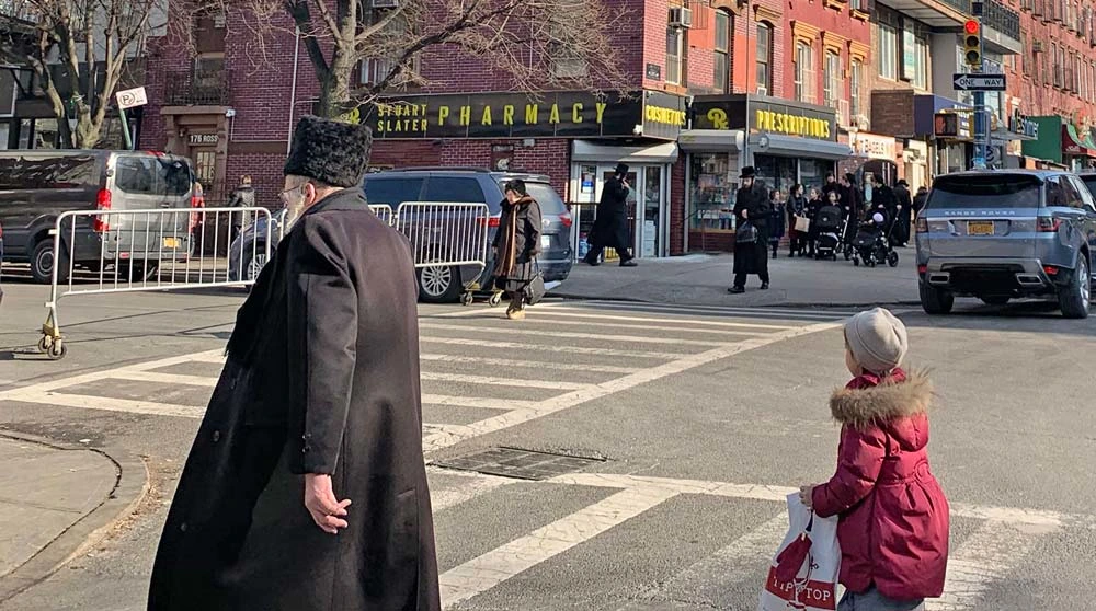 Jewish man walking in Brooklyn